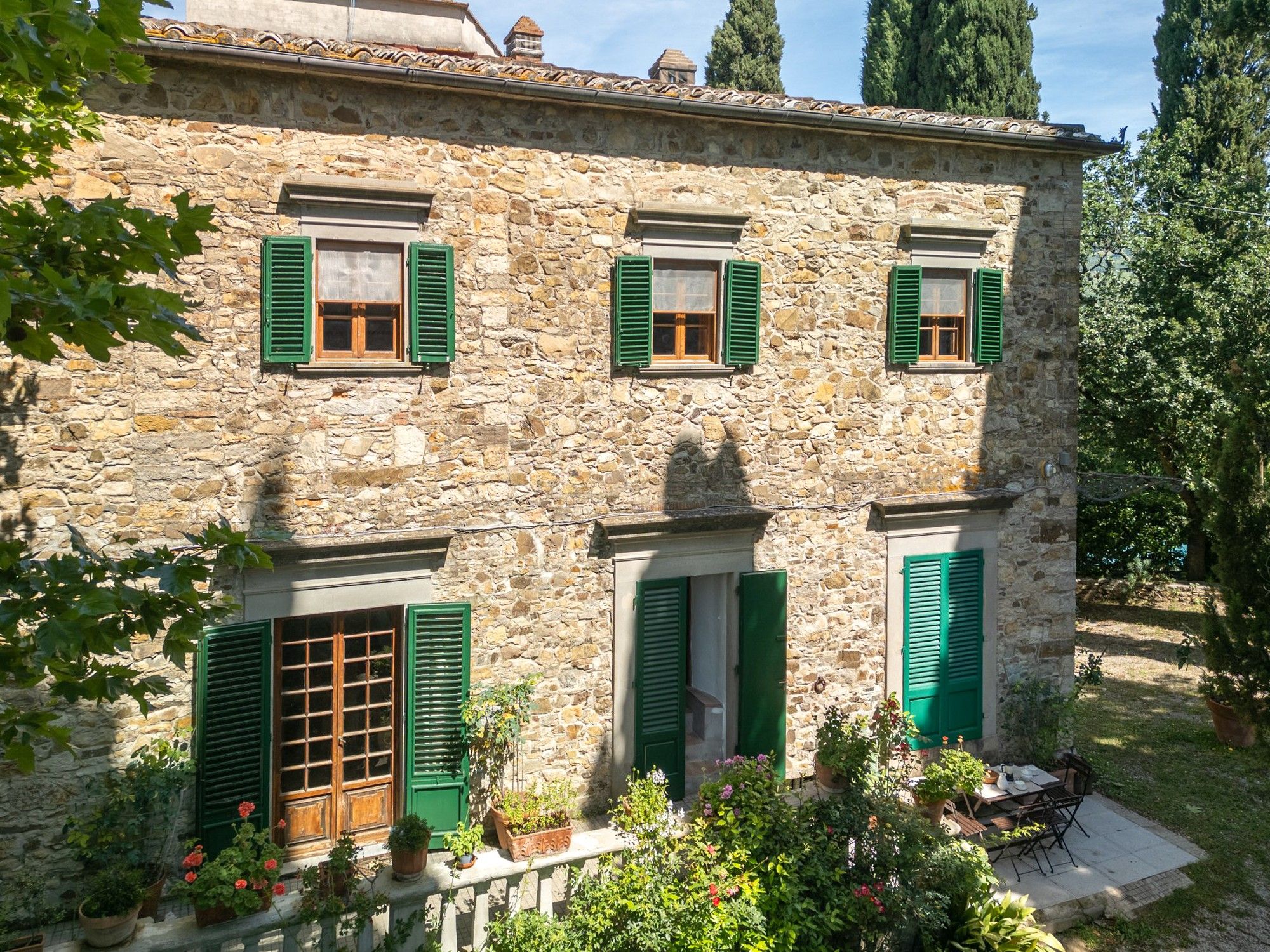Fotos Aldeia histórica com vila e casas residenciais em Castellina in Chianti